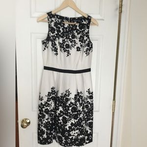 Classic black and white floral summer dress with Audrey Hepburn vibe.